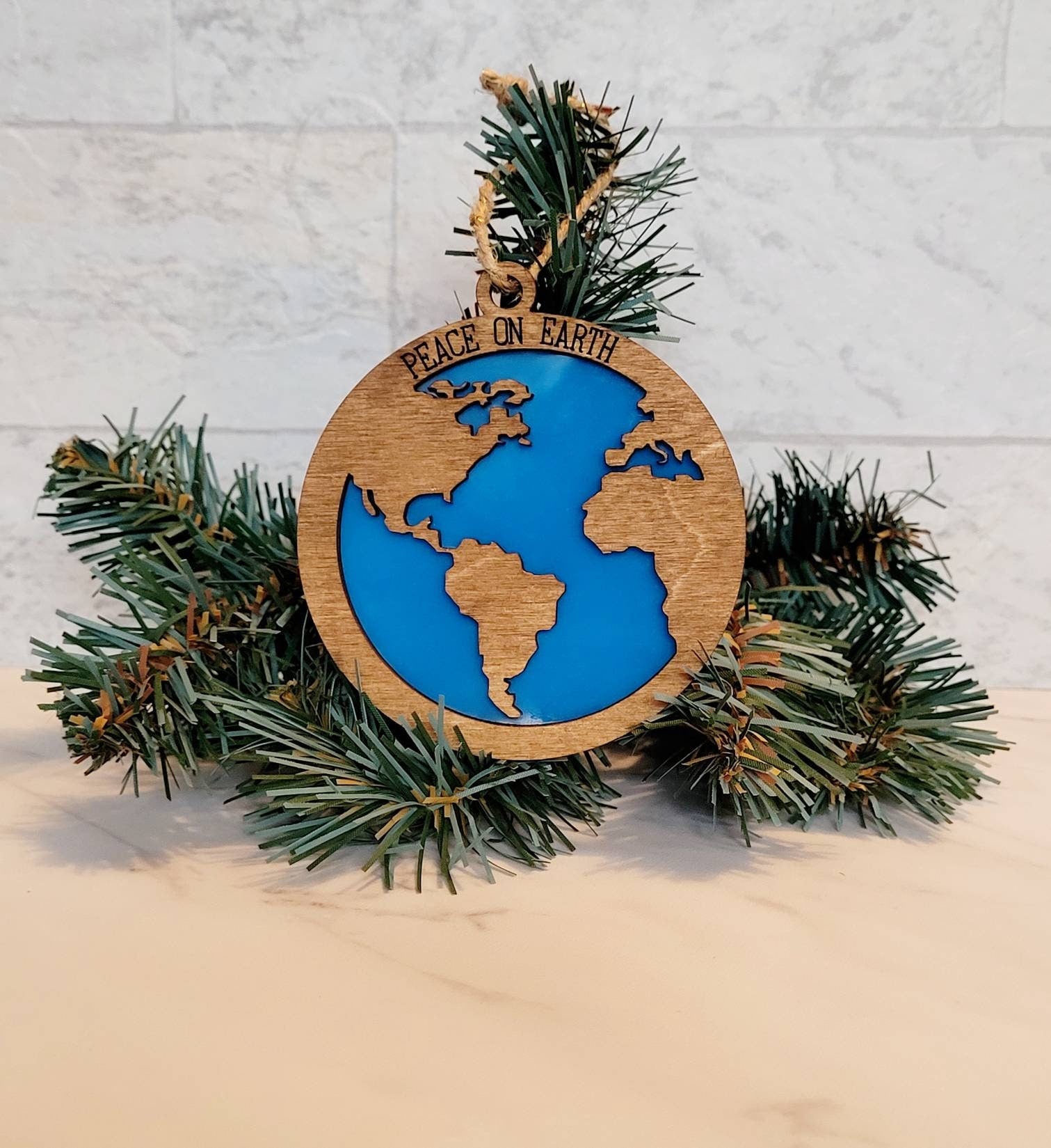 Peace on Earth laser cut Christmas ornament, World map and ocean layered ornament.