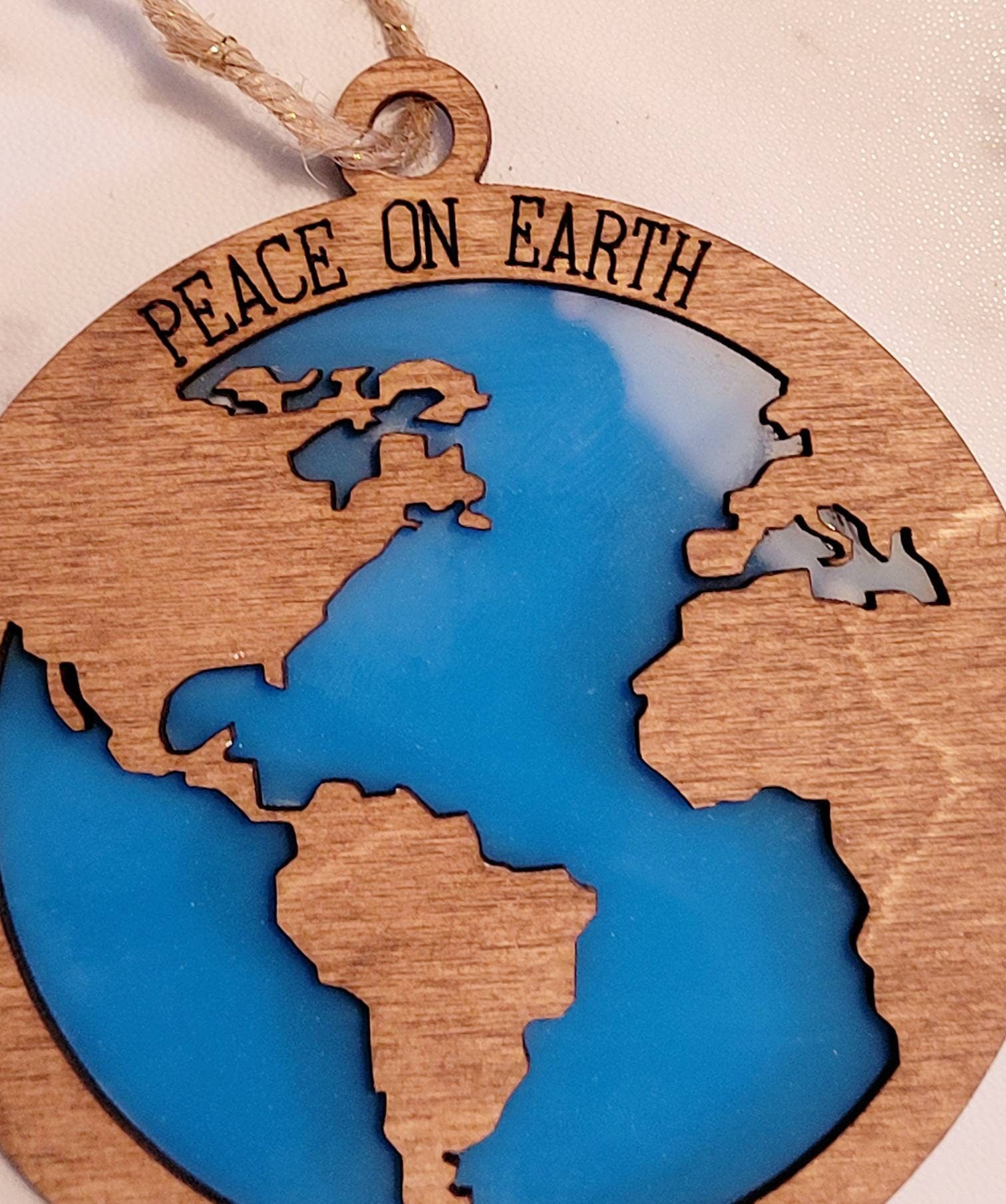 Peace on Earth laser cut Christmas ornament, World map and ocean layered ornament.